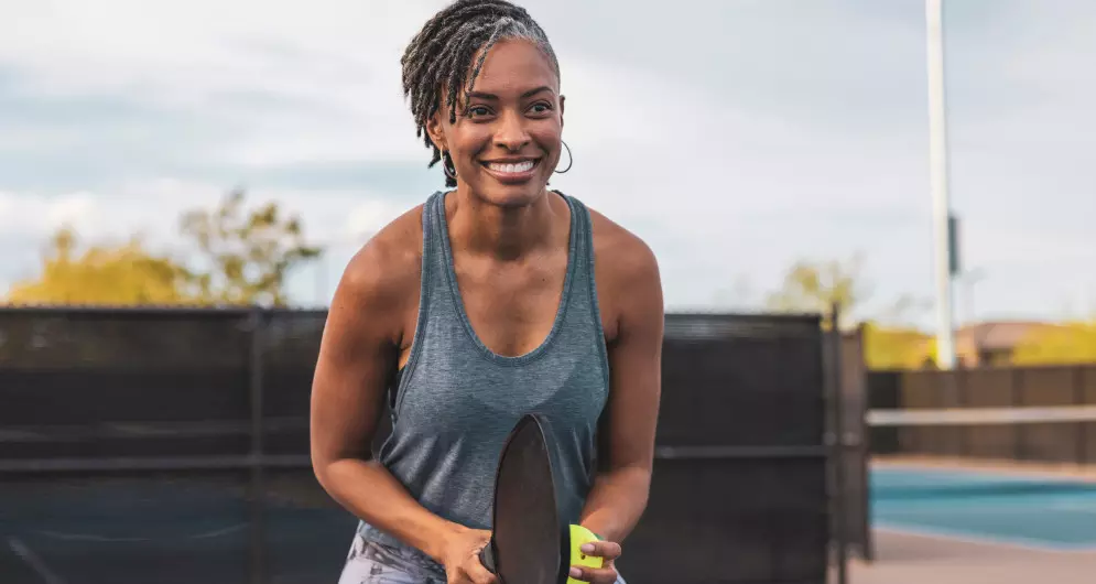 woman playing pickleball