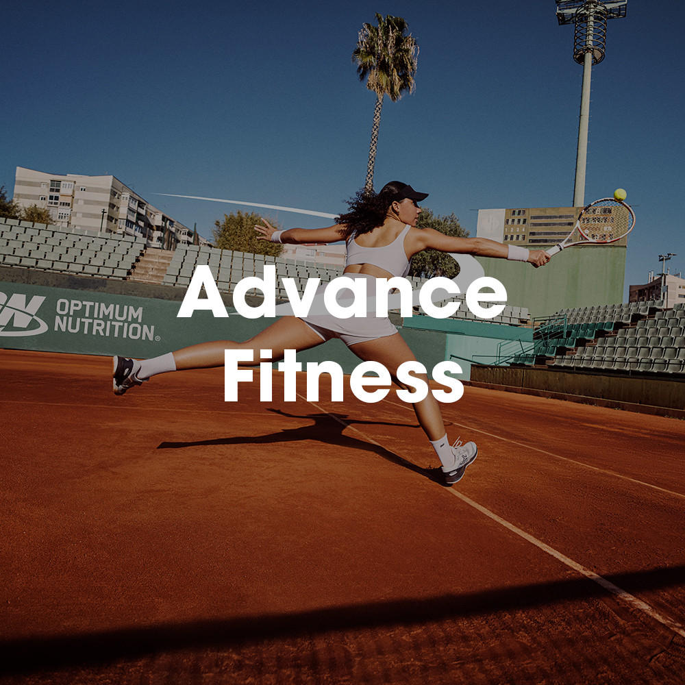 A person playing tennis on a clay court with Optimum Nutrition branding in the background