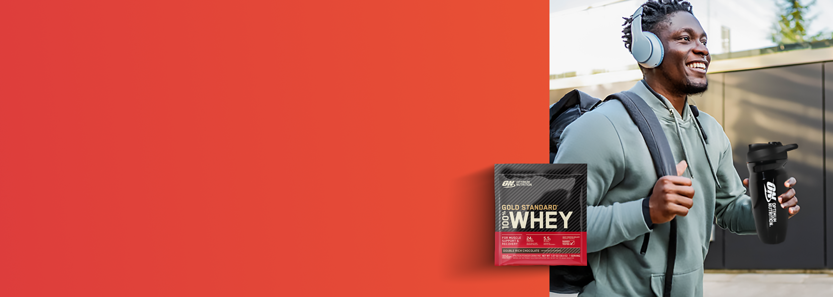 Man with headphones and a protein supplement container on an orange background