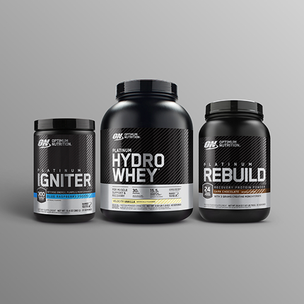 Optimum Nutrition supplement containers, including Platinum Igniter pre-workout, Hydro Whey protein, and Rebuild recovery protein