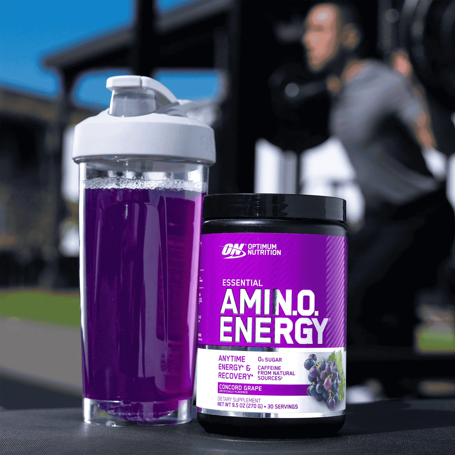 Optimum Nutrition Essential Amino Energy, Concord Grape flavor, 30 servings container next to a shaker bottle