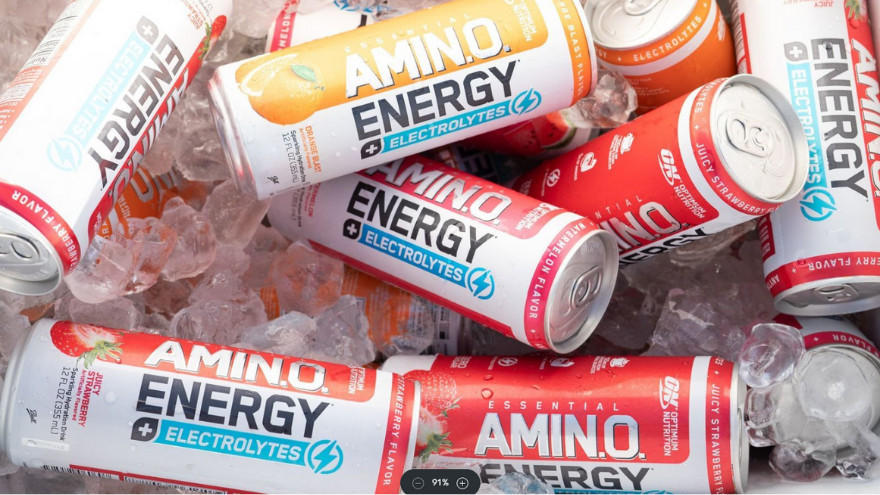 Amino Energy + Electrolytes cans on ice, featuring various fruit flavors for energy and hydration support