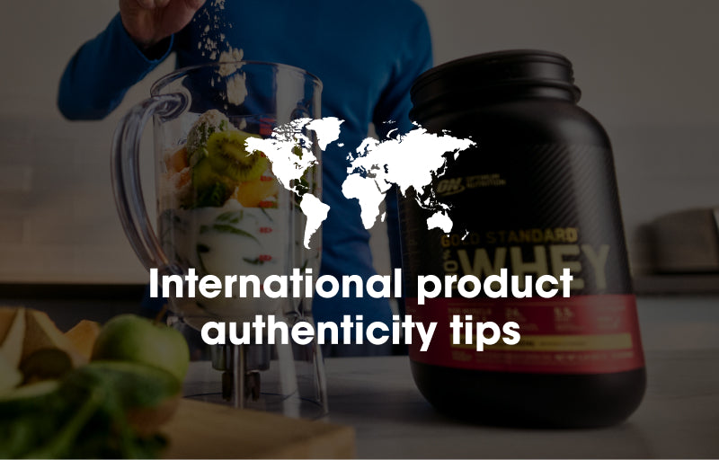 Optimum Nutrition Gold Standard 100% Whey Protein container next to a blender with ingredients