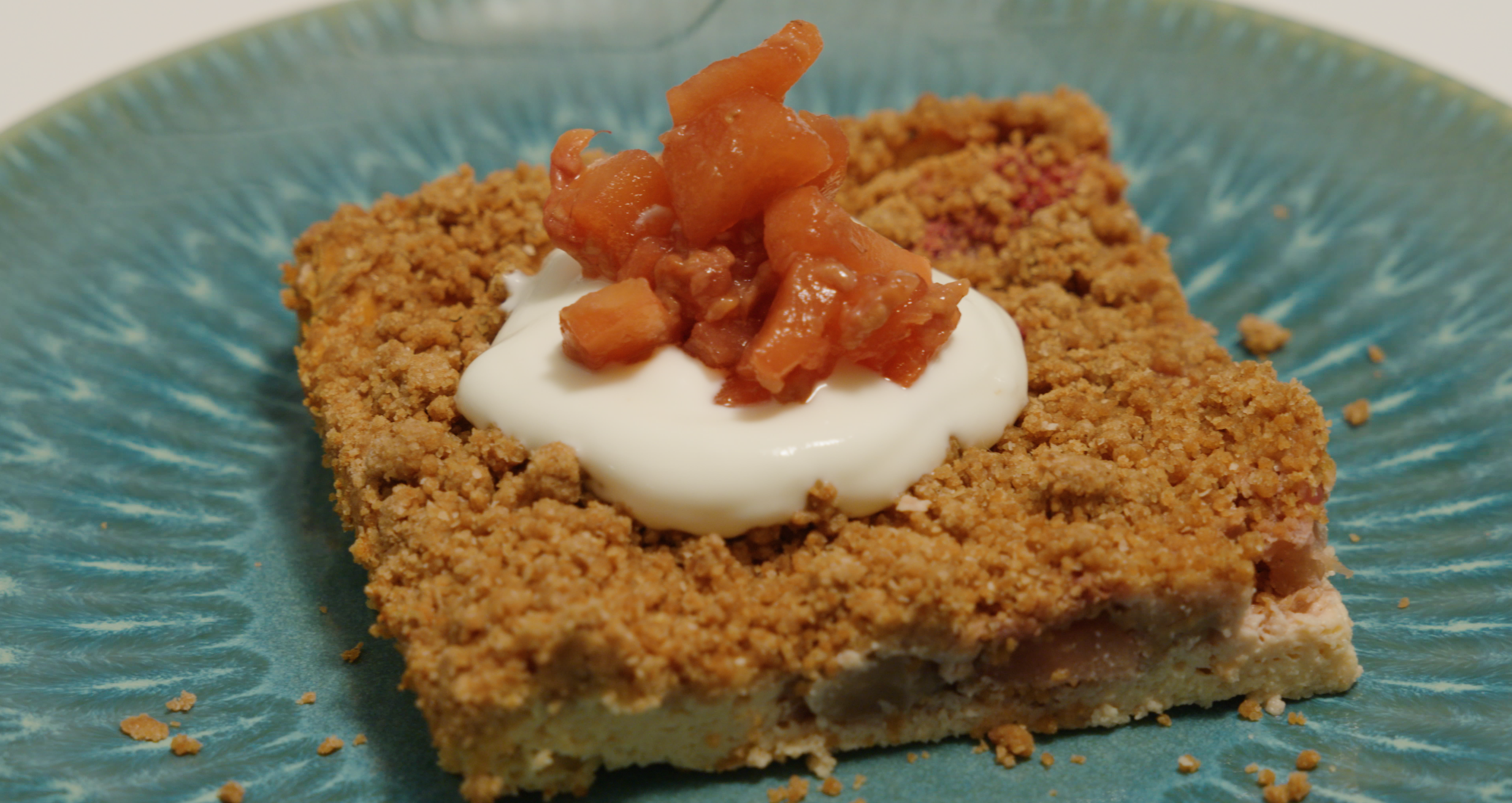 Apple and Raspberry Cheesecake Crumble on a dish