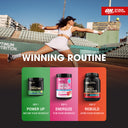 A promotional graphic for Optimum Nutrition's 'Winning Routine' featuring a female tennis player on a clay court above three product tubs. The products are: Power Up Creatine (green), Energize Amino Energy (pink), and Rebuild Whey Protein (orange).