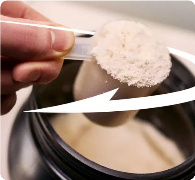 Scoop of Optimum Nutrition Gold Standard 100% Whey Protein powder being taken from container