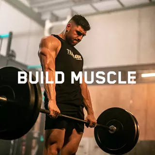 Man lifting a barbell in a gym setting, wearing a sleeveless shirt with "BUILD MUSCLE" text overlay