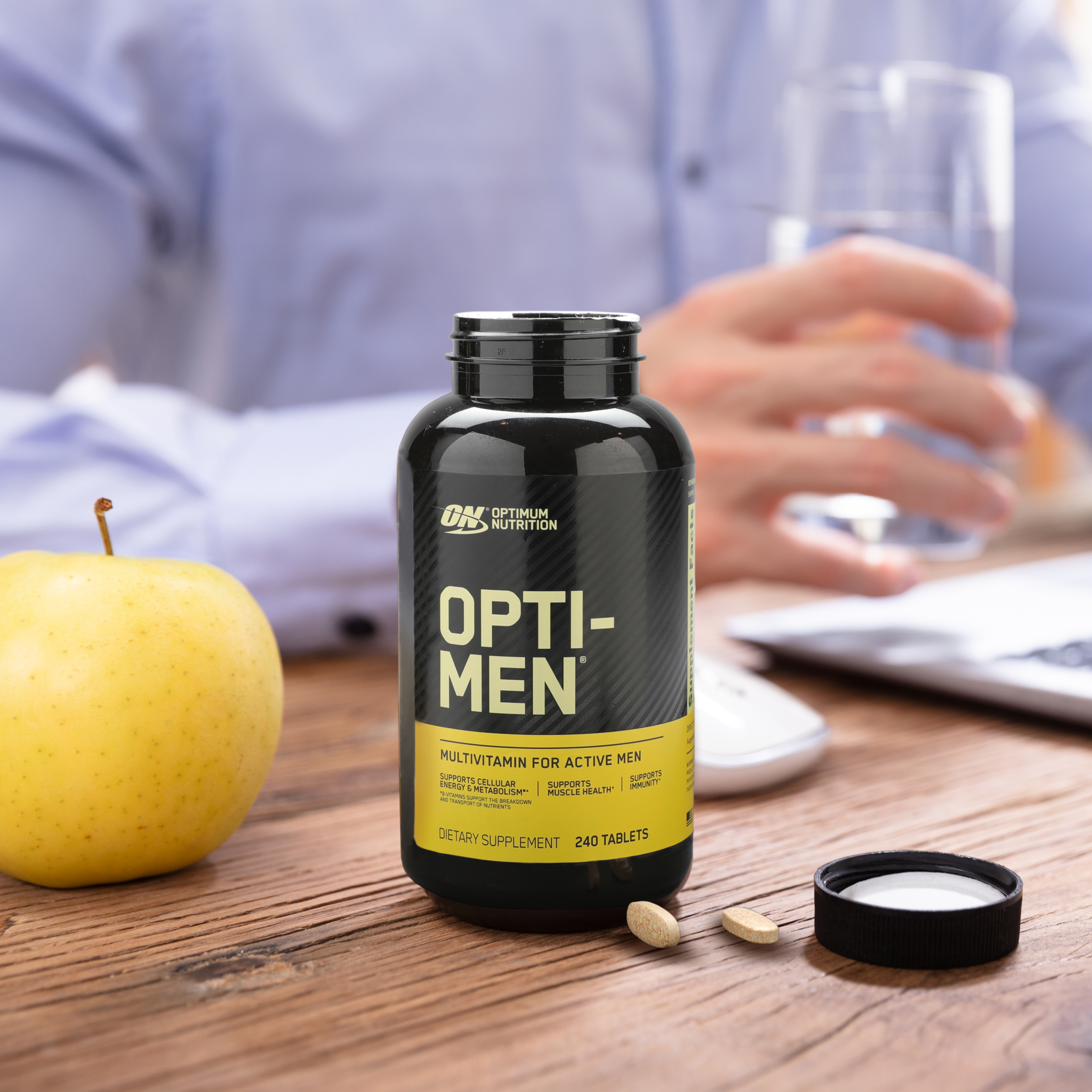tub of opti-men vitamins on the table